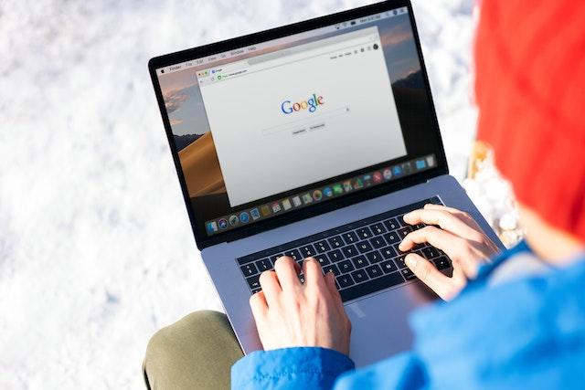 a person using Google on their laptop