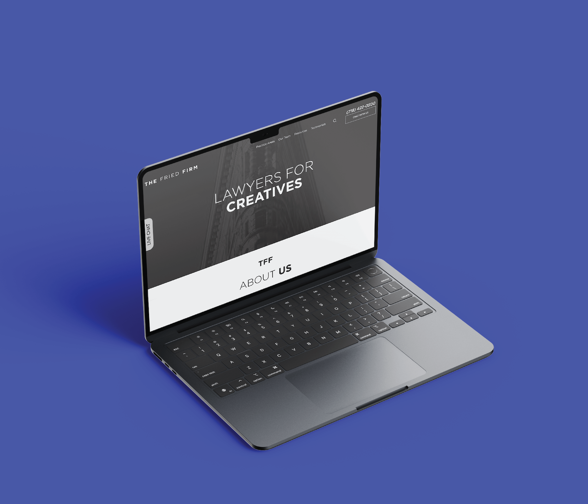 A sleek laptop on a blue background displays The Fried Firm website with the heading Lawyers for Creatives and subheading About Us for The Field Firm. The website features a grayscale, minimalist design.