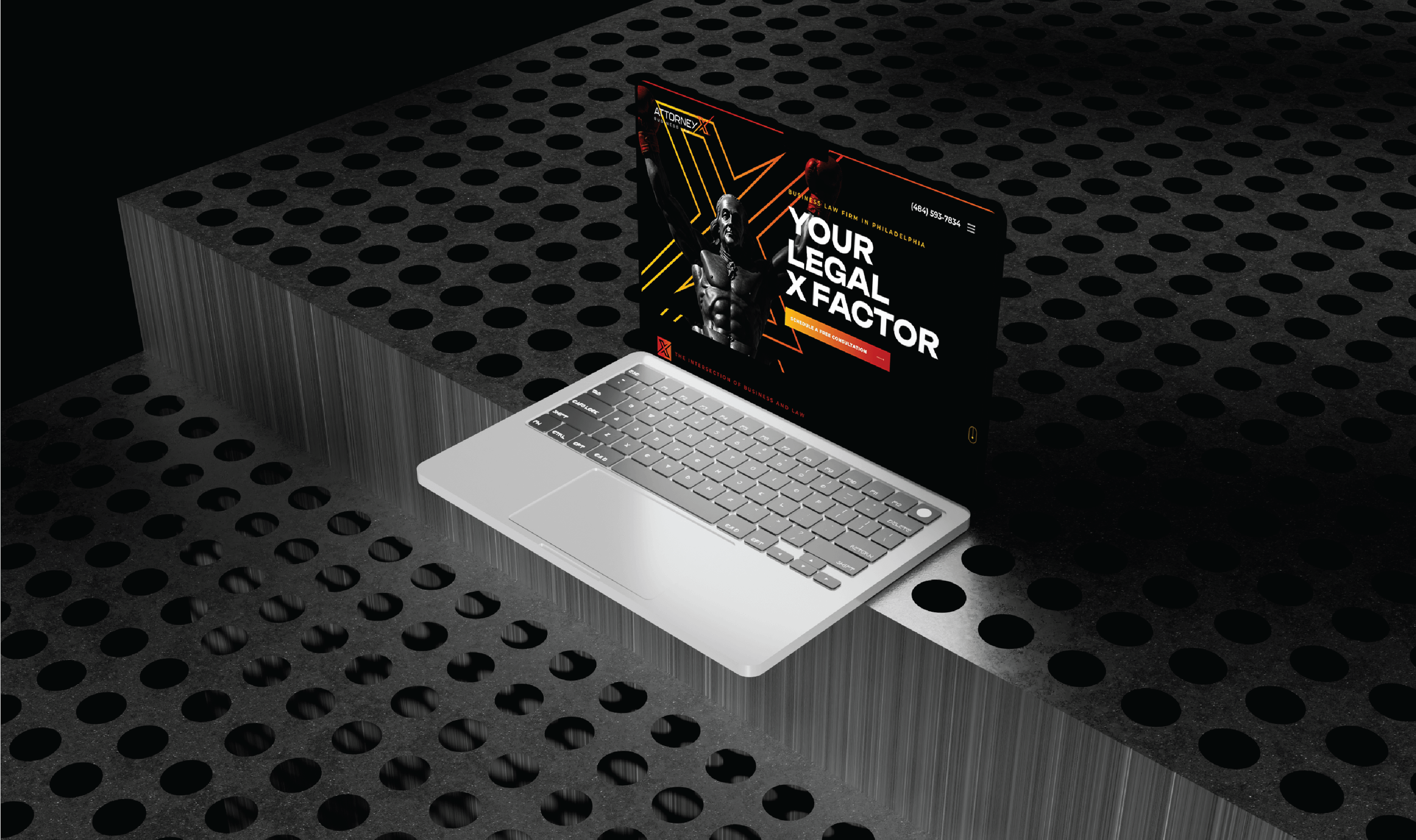 A silver laptop sits on a perforated metal surface, displaying a website titled 