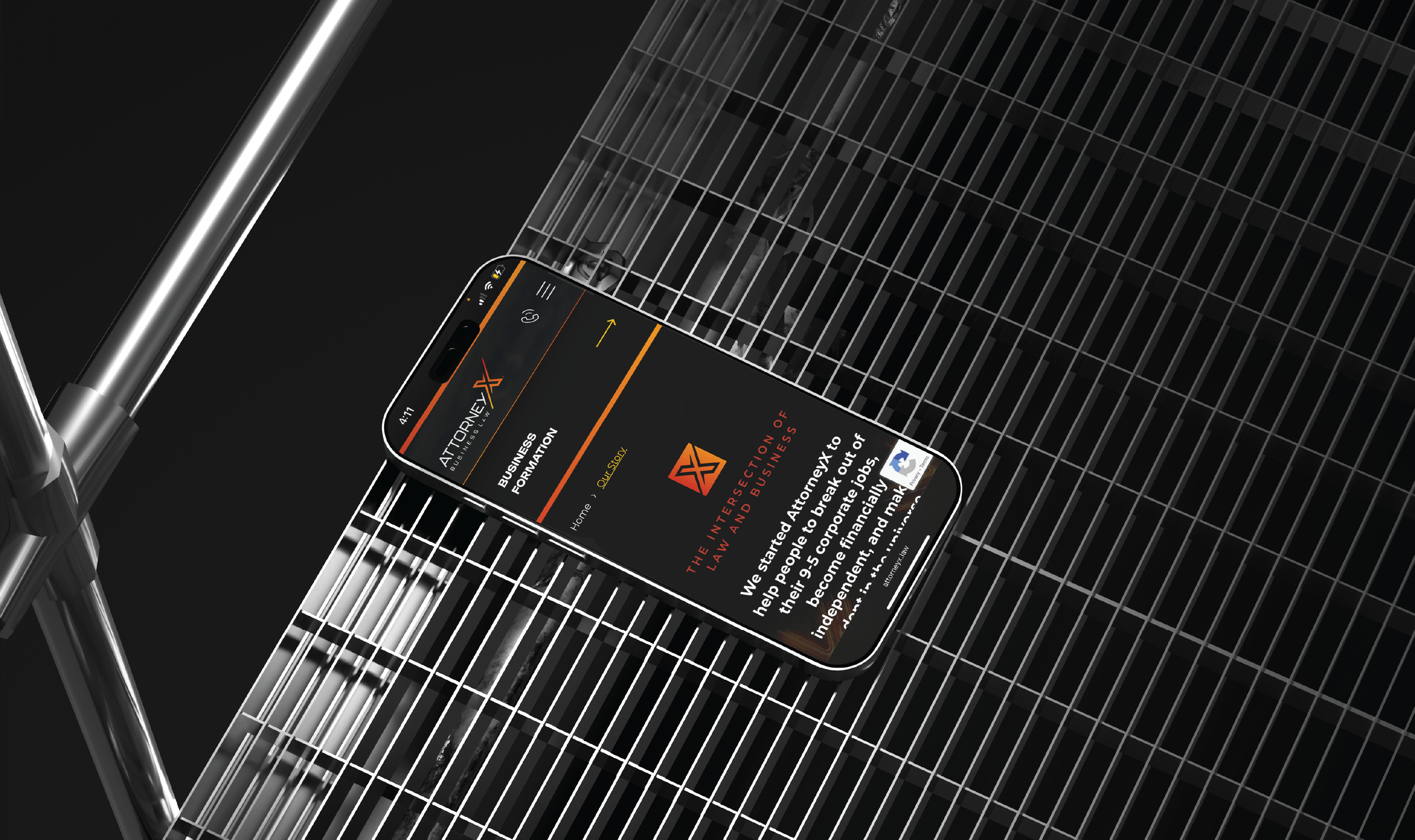 Smartphone with a dark screen displaying a website, placed on a metallic, grid-like surface beside metal bars, conveying a modern and sleek aesthetic.