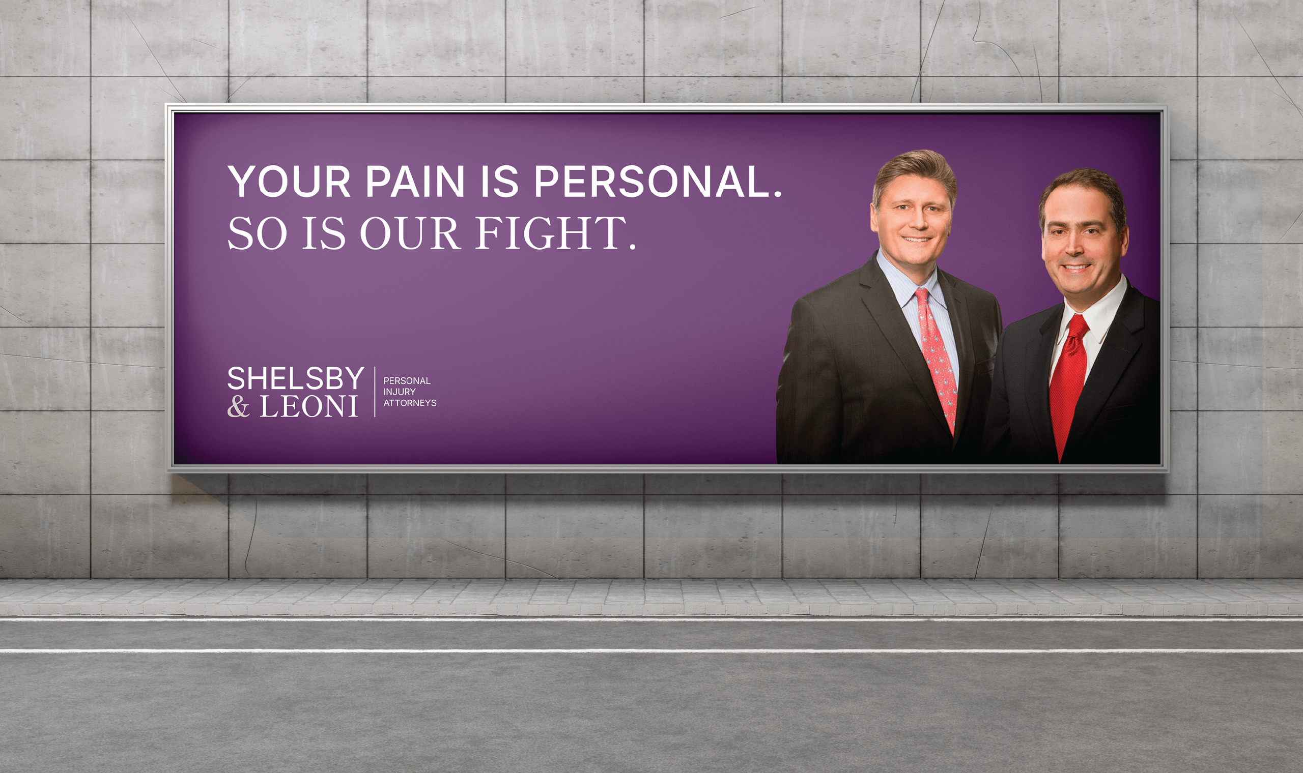Billboard featuring two men in suits with a professional tone. They are the named partners in the law firm Shelsby & Leoni. Text on a purple background reads, 